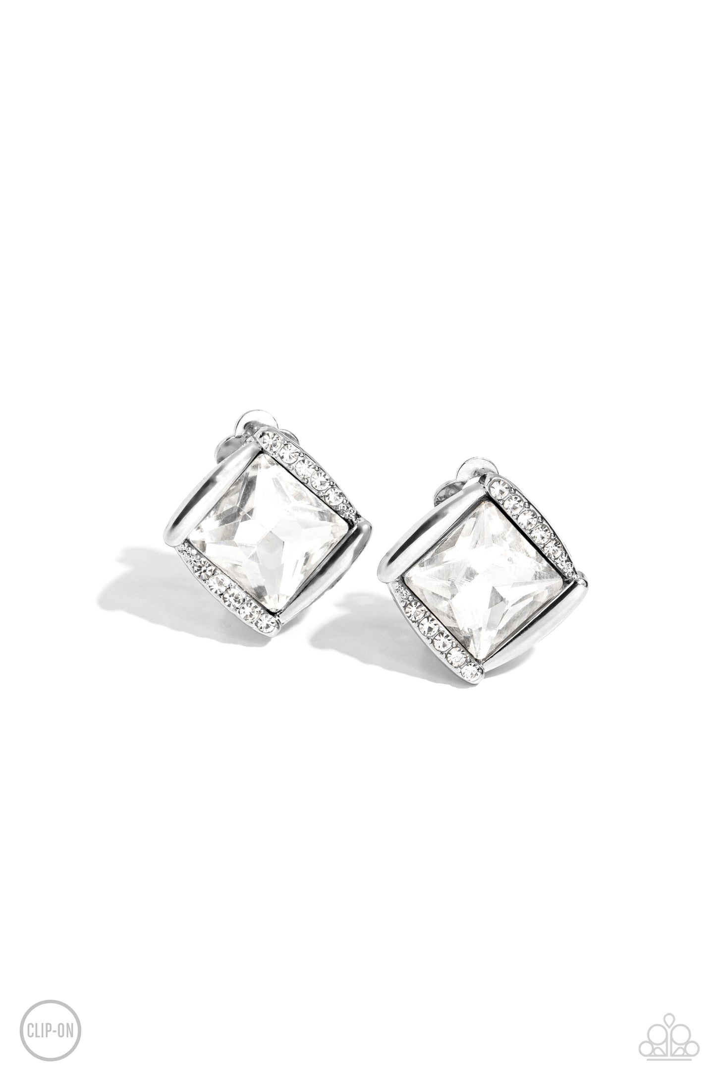 Sparkle Squared White Rhinestone Clip-On Earring - Paparazzi Accessories Shiny silver bars gently overlap with white rhinestone encrusted silver bars around a square cut white rhinestone, resulting in a refined radiance. Earring attaches to a standard clip-on fitting. Sold as one pair of clip-on earrings. P5CO-WTXX-136XX