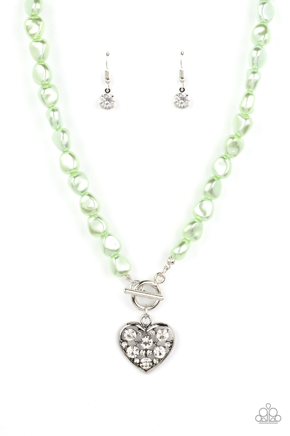 Color Me Smitten Green Necklace - Paparazzi Accessories  An imperfect collection of pearly green beads are threaded along an invisible wire below the collar, creating a colorful display. Dotted in glittery white rhinestones, an airy silver heart pendant sparkles at the center for a flirtatious finish. Features a toggle closure.  Sold as one individual necklace. Includes one pair of matching earrings.  P2RE-GRXX-264XX