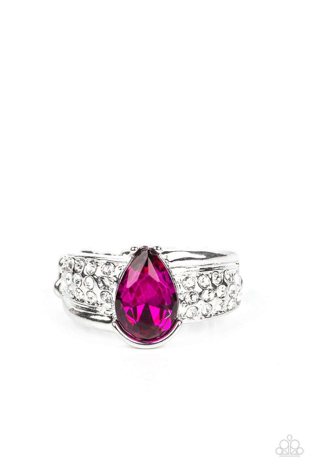 Dive into Oblivion Pink Ring - Paparazzi Accessories Swathed in rows of dainty white rhinestones, an asymmetrical silver band is adorned with a bedazzling pink teardrop rhinestone for a regal finish. Features a dainty stretchy band for a flexible fit. Sold as one individual ring.