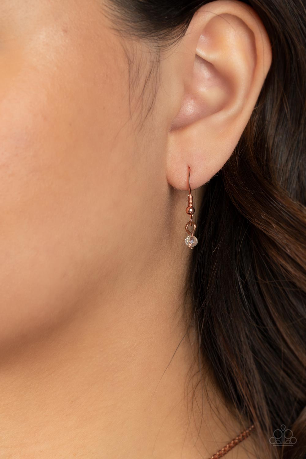 Stunning Supernova Copper Necklace - Paparazzi Accessories Dotted with a single shiny copper stud, a star-stamped shiny copper disc glistens at the bottom of a classic shiny copper chain. Infused with faceted copper beads, a stellar collection of clear crystal-like beads glides along a flat copper chain, resulting in out-of-this-world layers below the collar. Features an adjustable clasp closure. Sold as one individual necklace. Includes one pair of matching earrings.