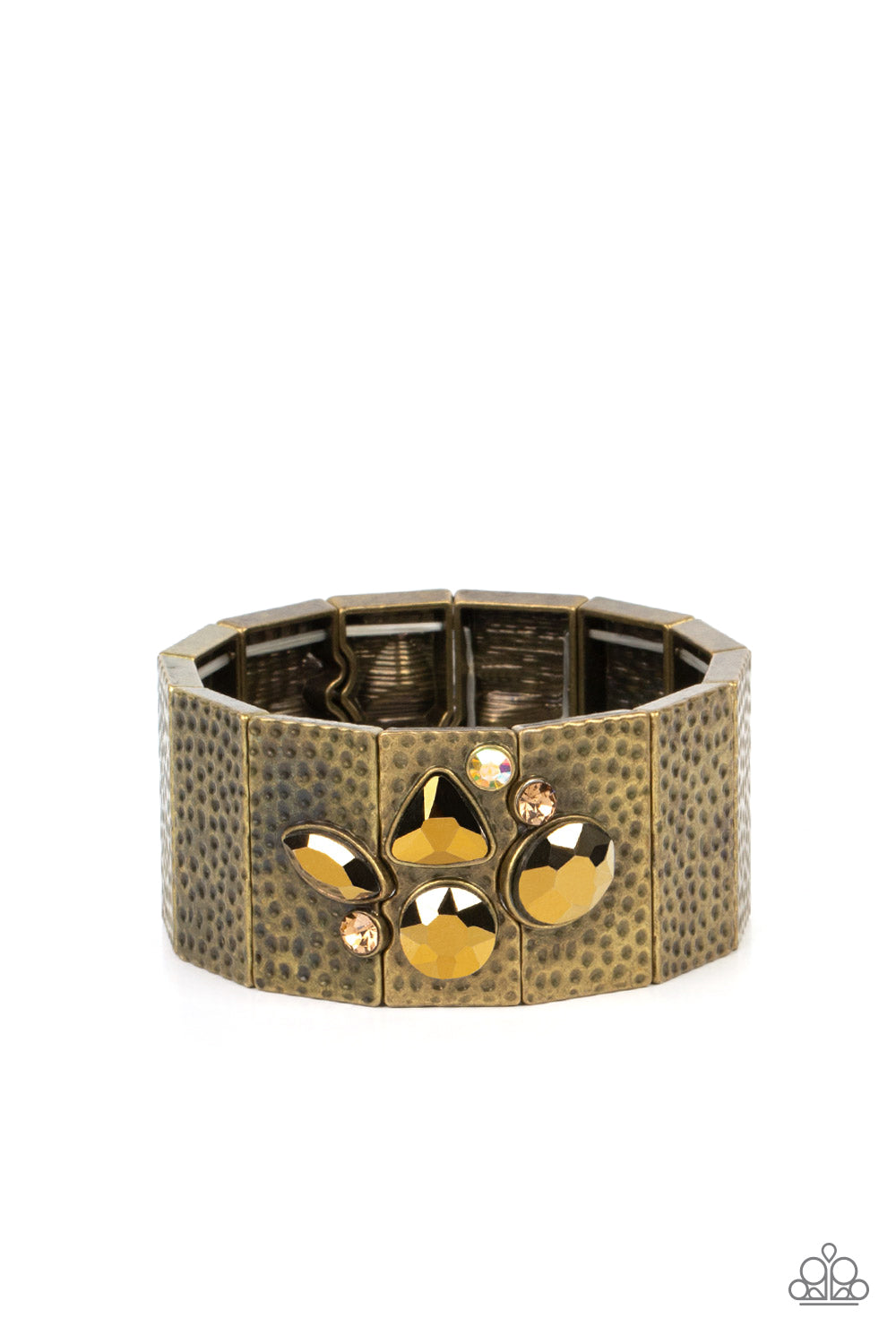 Flickering Fortune Brass Bracelet - Paparazzi Accessories Hammered in gritty shimmer, rustic, rectangular, brass frames are threaded along stretchy bands that wrap around the wrist. Mismatched topaz, iridescent, and aurum rhinestones cluster on the front and back of the piece, creating dueling centerpieces. Due to its prismatic palette, color may vary. Sold as one individual bracelet.