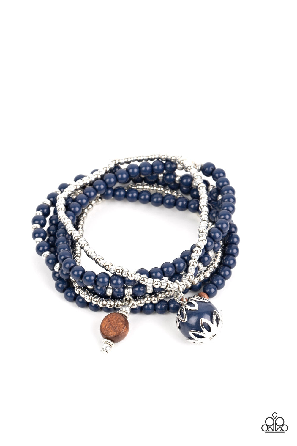 Epic Escapade Blue Bracelet - Paparazzi Accessories A mismatched collection of silver, navy blue, and wooden beads are threaded along stretchy bands around the wrist. An ornate navy blue and wooden bead trickles from the layers, adding whimsical accents to the earthy display. Sold as one set of six bracelets. P9SE-BLXX-416XX