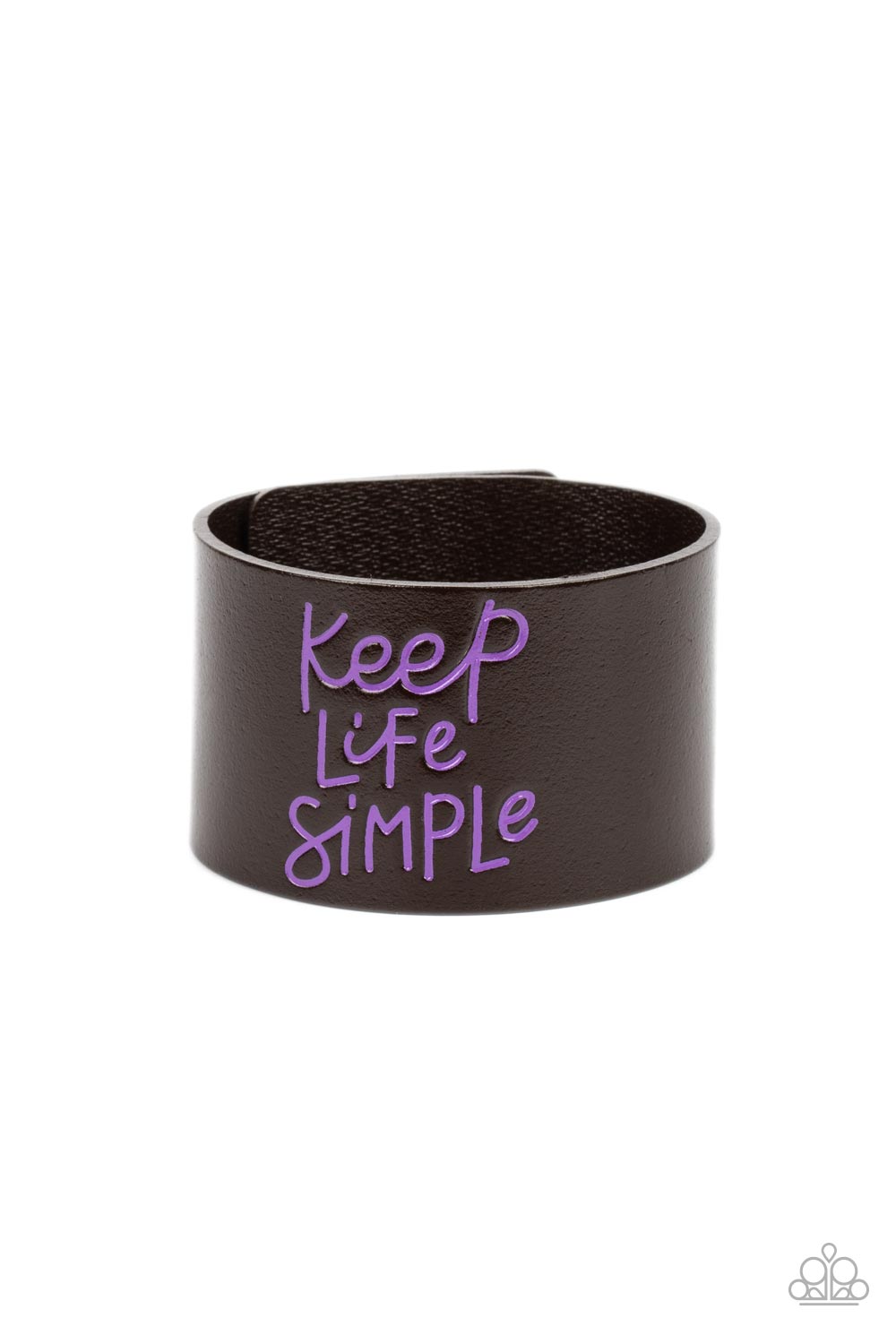 Simply Stunning Purple Wrap Bracelet - Paparazzi Accessories A thick band of dark brown leather is stamped in the phrase, "Keep Life Simple," in purple script. The playful font emphasizes the lighthearted message as the band wraps around the wrist in a casual finish. Features an adjustable snap closure. Sold as one individual bracelet.