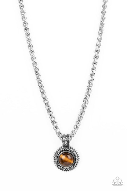 Pendant Dreams Brown Urban Necklace - Paparazzi Accessories   A textured silver frame spins around a tiger's eye stone center, creating a tranquil statement piece. The reflective pendant is anchored by a textured silver fixture, adding eye-catching dimension as the pendant slides along a thick strand of silver wheat chain. Features an adjustable clasp closure. As the stone elements in this piece are natural, some color variation is normal.  Sold as one individual necklace.