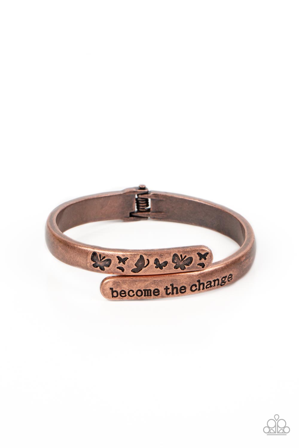 WINGS of Change Copper Hinge Bracelet - Paparazzi Accessories Antiqued copper bars curve and overlap around the wrist, creating a stacked design. One copper bar is stamped with the phrase, "become the change," while the other features engraved butterfly silhouettes in an inspiring finish. Features a hinged closure. Sold as one individual bracelet.