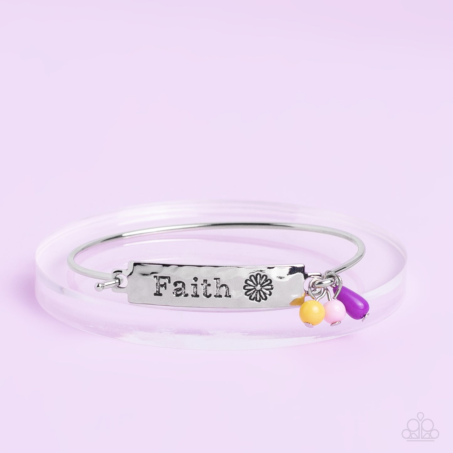 Flirting with Faith Purple Bracelet - Paparazzi Accessories  The word "Faith" and a whimsical daisy silhouette are stamped across a thick hammered plate of silver. Three acrylic beads in the shades of Primrose, purple, and baby pink add a dash of color to this inspirational piece, gathering together where the plate attaches to a skinny silver cuff. Features a hook and eye closure.  Sold as one individual bracelet.
