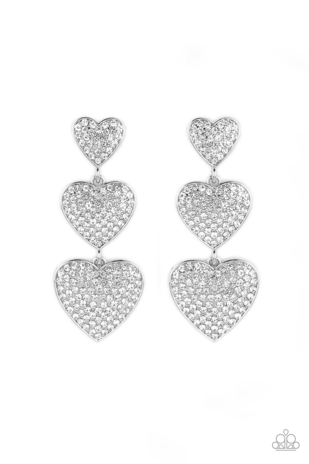 Couples Retreat White Heart Post Earring - Paparazzi Accessories Three white rhinestone-studded silver hearts gradually increase in size as they cascade down the ear in a shimmery display. Each of the hearts interconnect to one another adding a shifting, whimsical detail to the spritz of glitz. Earring attaches to a standard post fitting. Sold as one pair of post earrings.