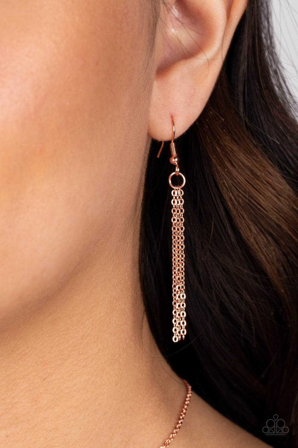 Hugs and Kisses Copper Necklace - Paparazzi Accessories A shiny copper letter "X" and a letter "O" in the same metallic sheen, slide along a classic shiny copper chain, creating a dainty, fun-loving design. Features an adjustable clasp closure. Sold as one individual necklace. Includes one pair of matching earrings.