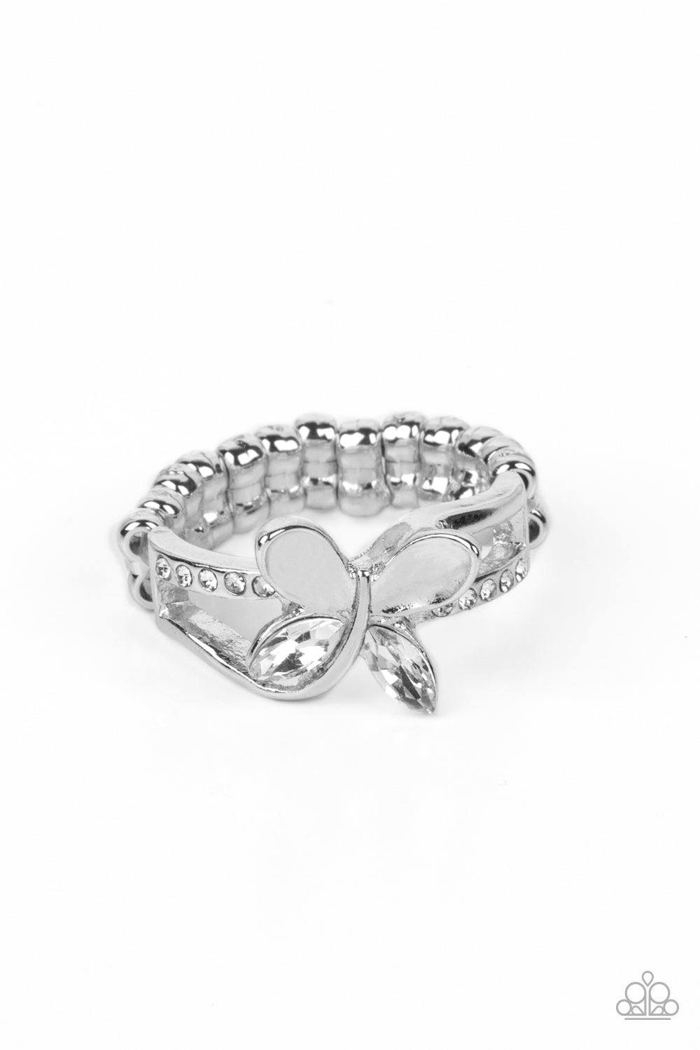 Fetching Flutter White Ring - Paparazzi Accessories A silver butterfly, with dainty, marquise-cut, white rhinestone hind-wings, flutters atop a layered silver cuff for an enchanting fashion. The butterfly is anchored to the ring with bars of dainty curved silver, while a more solid layer of silver is encrusted with dainty, white rhinestones. Features a dainty stretchy band for a flexible fit. Sold as one individual ring.
