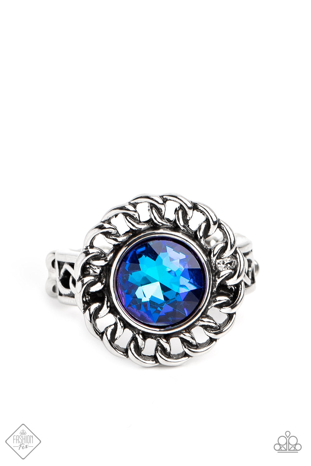 Round Table Runway Blue Ring - Paparazzi Accessories High-sheen silver chain links encircle a vibrant, faceted blue gem center, creating a gorgeous contrast of grit and glam. A band of silver chain link arcs across the finger underneath the colorful centerpiece, resulting in an edgy centerpiece that sits boldly atop the finger. Features a dainty stretchy band for a flexible fit. Sold as one individual ring.