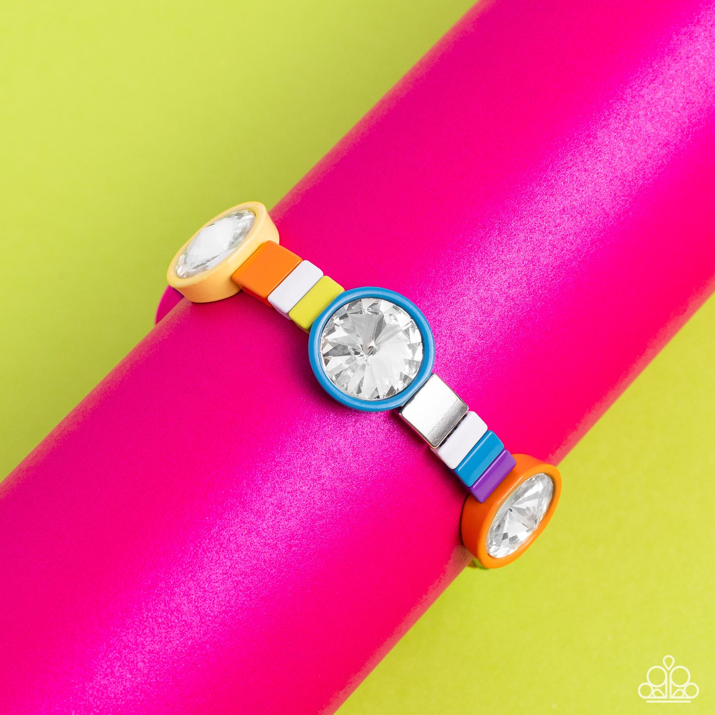 Multicolored Madness Multi Bracelet - Paparazzi Accessories Strung along elastic stretchy bands, a bodacious collection of silver accents, and varying metallic accents dipped in multicolored shades encircle the wrist. Sporadically infused between the colorful display, concaved circular frames in orange, yellow, purple, Pink Peacock, and blue shades feature faceted white gems that come to a point for a touch of sparkle. Sold as one individual bracelet. P9ST-MTXX-038XX