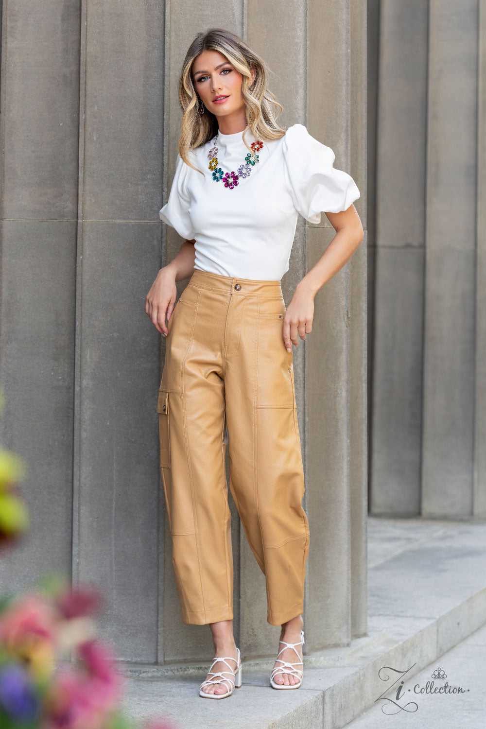 Outgoing Multi Flower 2023 Zi Collection Necklace - Paparazzi Accessories Colorful teardrop-shaped petals fan out around clusters of corrugated sparkle, blossoming into an enchanted kaleidoscope. The faceted surfaces of each petal add texture and depth, allowing the floral frames to pop with 3D detail and further highlight the spectrum of color at play. Features an adjustable clasp closure.