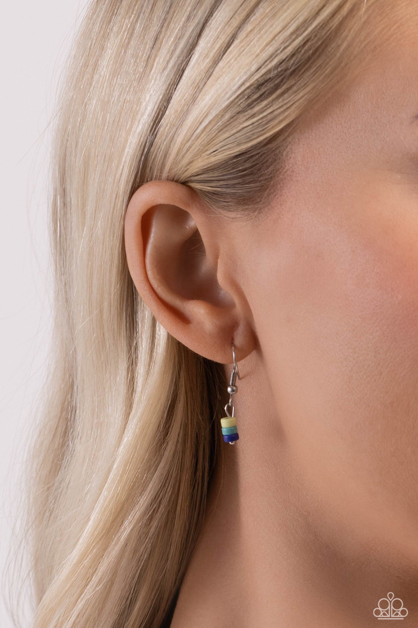 Oasis Outline Blue Necklace - Paparazzi Accessories Infused with dainty silver accents, multicolored stone discs featuring a startling blue, are threaded along an invisible wire below the collar creating a natural pop of seasonal inspiration. Features an adjustable clasp closure. As the stone elements in this piece are natural, some color variation is normal. Sold as one individual necklace. Includes one pair of matching earrings. P2SE-URBL-069XX