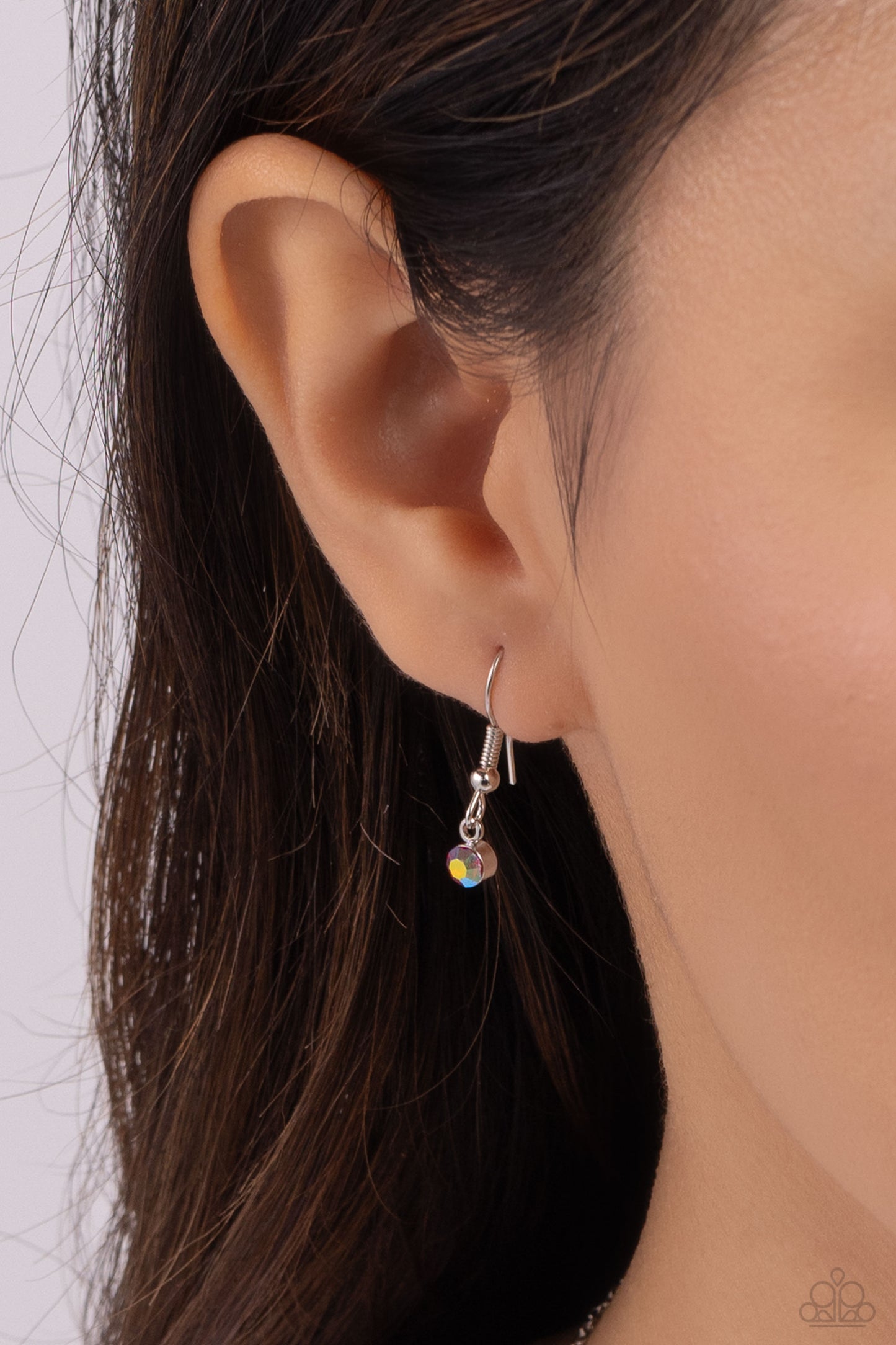 Devoted Delicacy Pink Heart Necklace - Paparazzi Accessories Gliding along a dainty silver chain, a light pink gem heart, set in pronged fittings, stands out against the neckline. A smaller pink iridescent-embossed silver heart lays next to the gem heart for additional eye-catching color. Features a stretchy band for a flexible fit. Due to its prismatic palette, color may vary. Sold as one individual necklace. Includes one pair of matching earrings. SKU: P2DA-PKXX-195XX