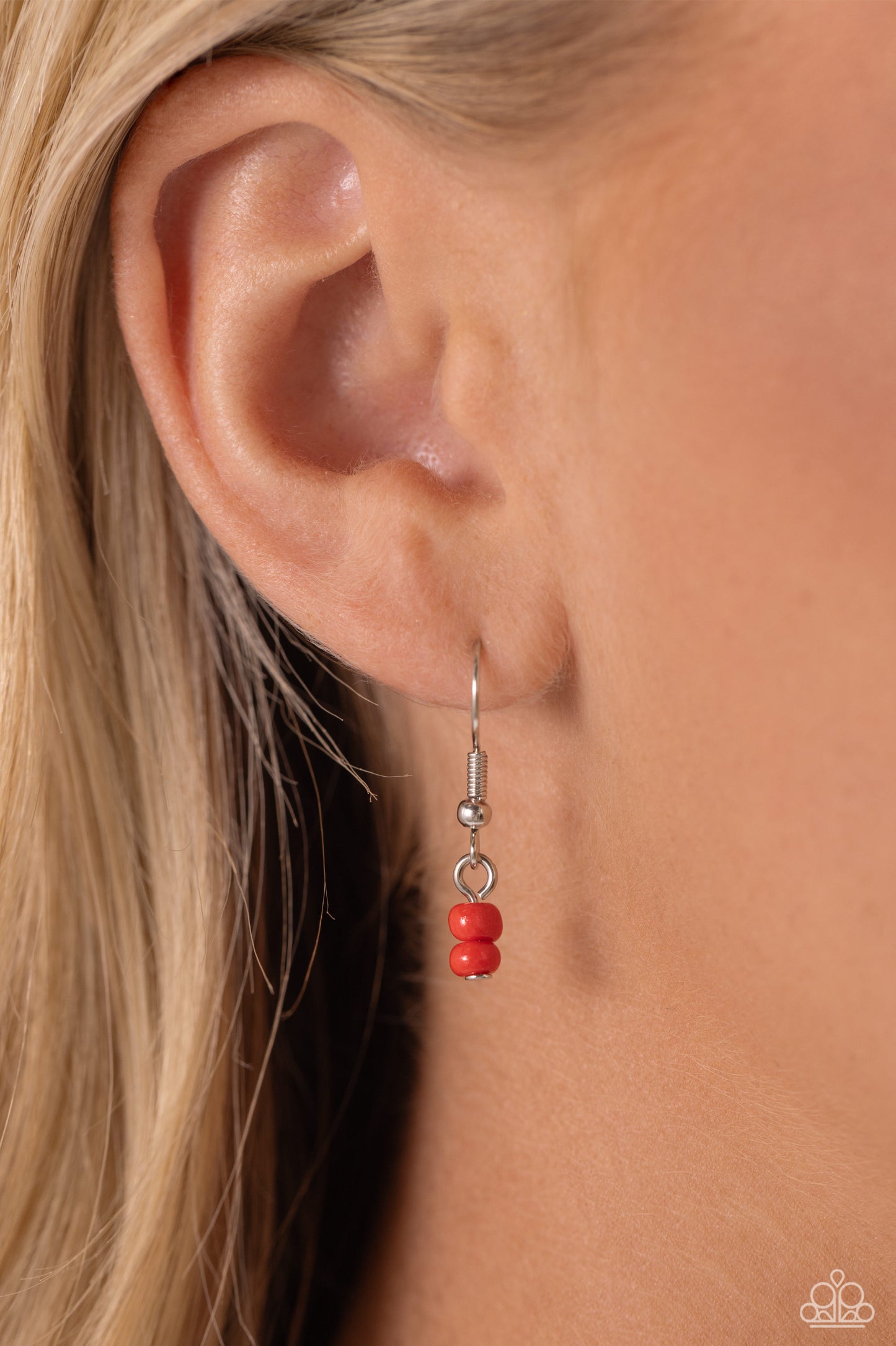 Pearly Possession Red Peace Necklace - Paparazzi Accessories Infused along an invisible string, red, baby pink, and tiffany seed beads combine with sporadically placed red discs, and glossy white and heart-shaped pearls for a vibrant pop of color along the neckline. A silver peace sign featuring red and tiffany paint dangles from the colorful strand for a groovy finish. Features an adjustable clasp closure. Sold as one individual necklace. Includes one pair of matching earrings. P2DA-RDXX-105XX