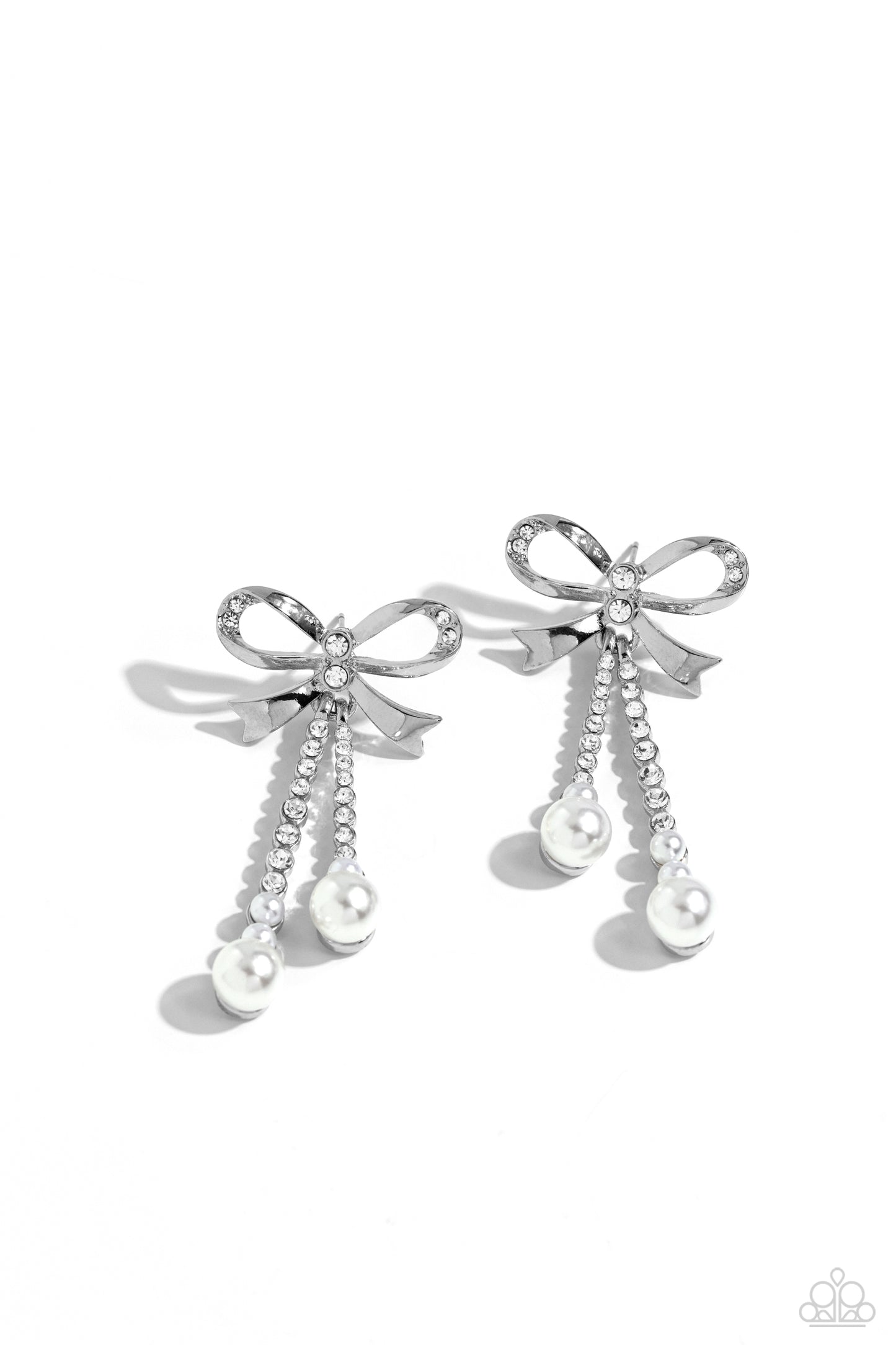 Bodacious Bow White Post Earring - Paparazzi Accessories Adorned in sparkling white rhinestones, high-sheen bands of silver curl and loop into a stunning bow charm, creating a classy statement at the ear. White rhinestones encased in scalloped silver fittings, featuring white pearls that slowly increase in size dangle from the bow charm adding a refined tassel to the stunning display. Earring attaches to a standard post fitting. Sold as one pair of post earrings. P5PO-WTXX-383XX