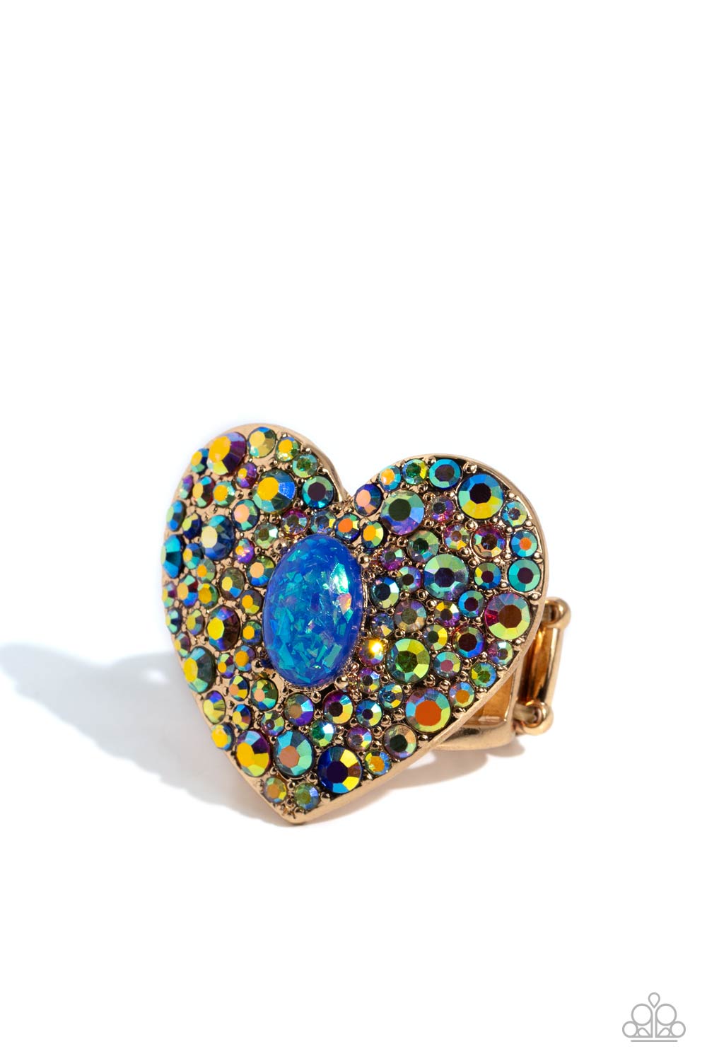 Bejeweled Beau Blue Ring - Paparazzi Accessories Encrusted in brilliant multicolored and iridescent rhinestones, a glittery gold heart frame adorns the center of an airy gold band for a flirtatious finish. Featuring iridescent flecks, an opalescent blue oval bead is pressed in the center of the heart frame for additional eye-catching shimmer. Features a stretchy band for a flexible fit. Due to its prismatic palette, color may vary. Sold as one individual ring. P4ST-BLXX-029XX