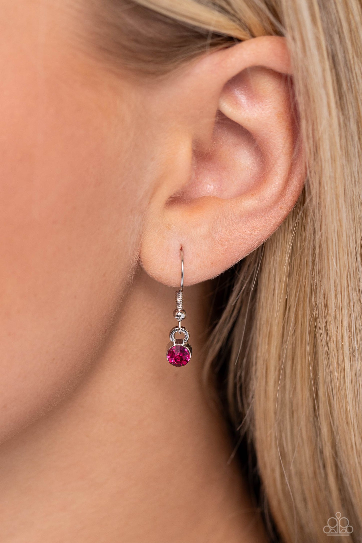 Sliding Splendor Pink Necklace - Paparazzi Accessories Featuring a lightly hammered sheen, asymmetrical silver ovals, some with airy silhouettes and exaggerated fuchsia gem centers, give off a hand-made feel as they shift and slide through multiple strands of black cording for an artisanal design below the collar. Features an adjustable clasp closure. Sold as one individual necklace. Includes one pair of matching earrings. Sku: P2RE-PKXX-409XX