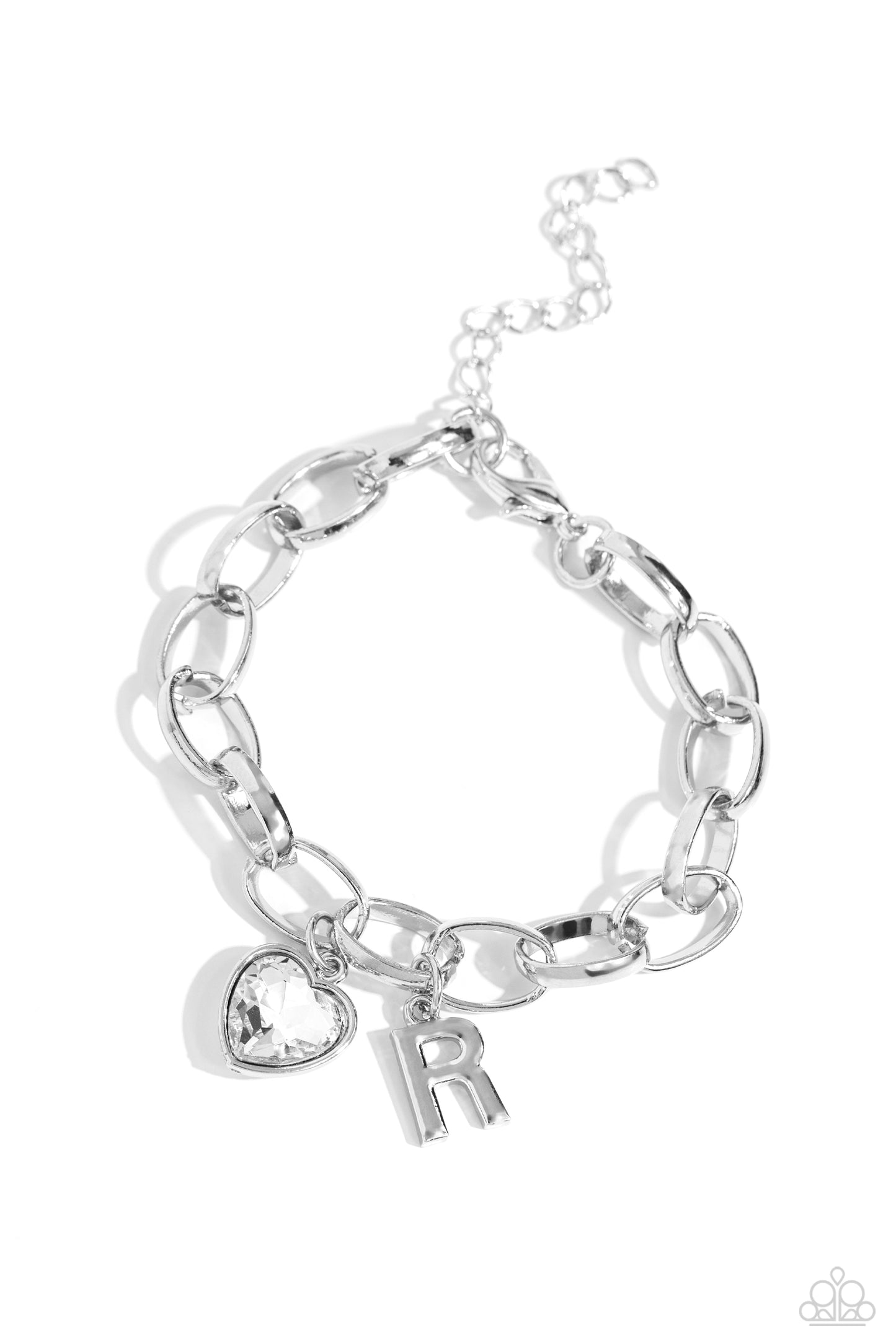 Guess Now Its INITIAL White "R" Bracelet - Paparazzi Accessories A simple collection of silver charms — including a white rhinestone heart pressed in a silver frame and a sleek letter "R" — dance from a chunky silver chain around the wrist, creating a sentimental fringe. Features an adjustable clasp closure. Sold as one individual bracelet. New Kit Sku: P9BA-WTXX-052XX
