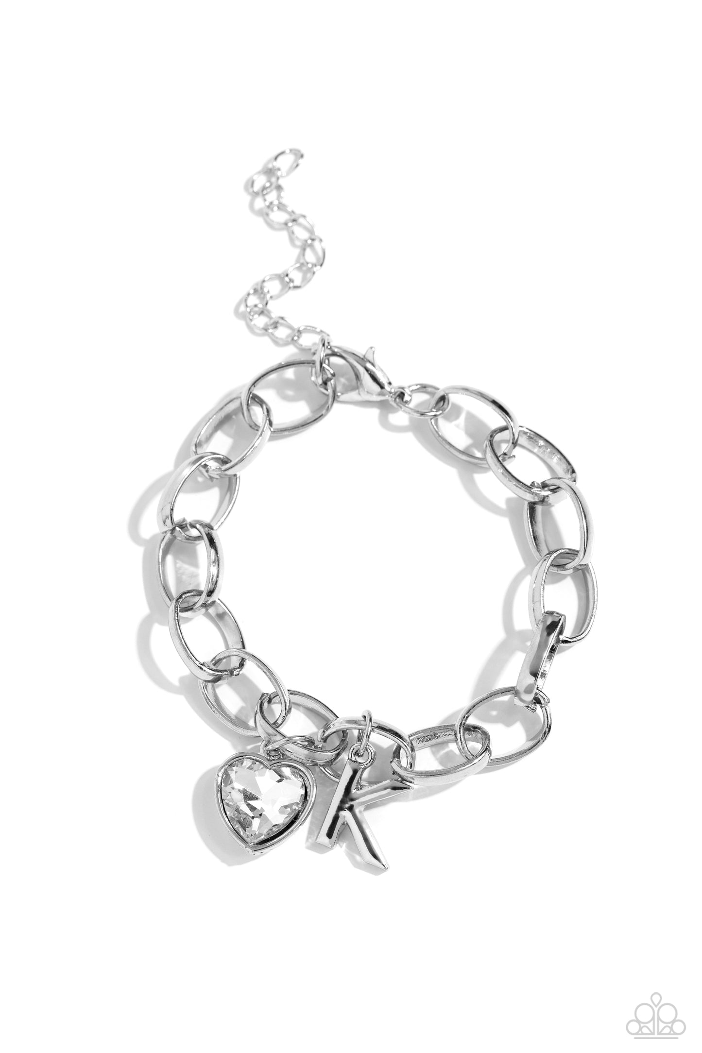 Guess Now Its INITIAL White "K" Bracelet - Paparazzi Accessories A simple collection of silver charms — including a white rhinestone heart pressed in a silver frame and a sleek letter "K" — dance from a chunky silver chain around the wrist, creating a sentimental fringe. Features an adjustable clasp closure. Sold as one individual bracelet. New Kit Sku: P9BA-WTXX-045XX