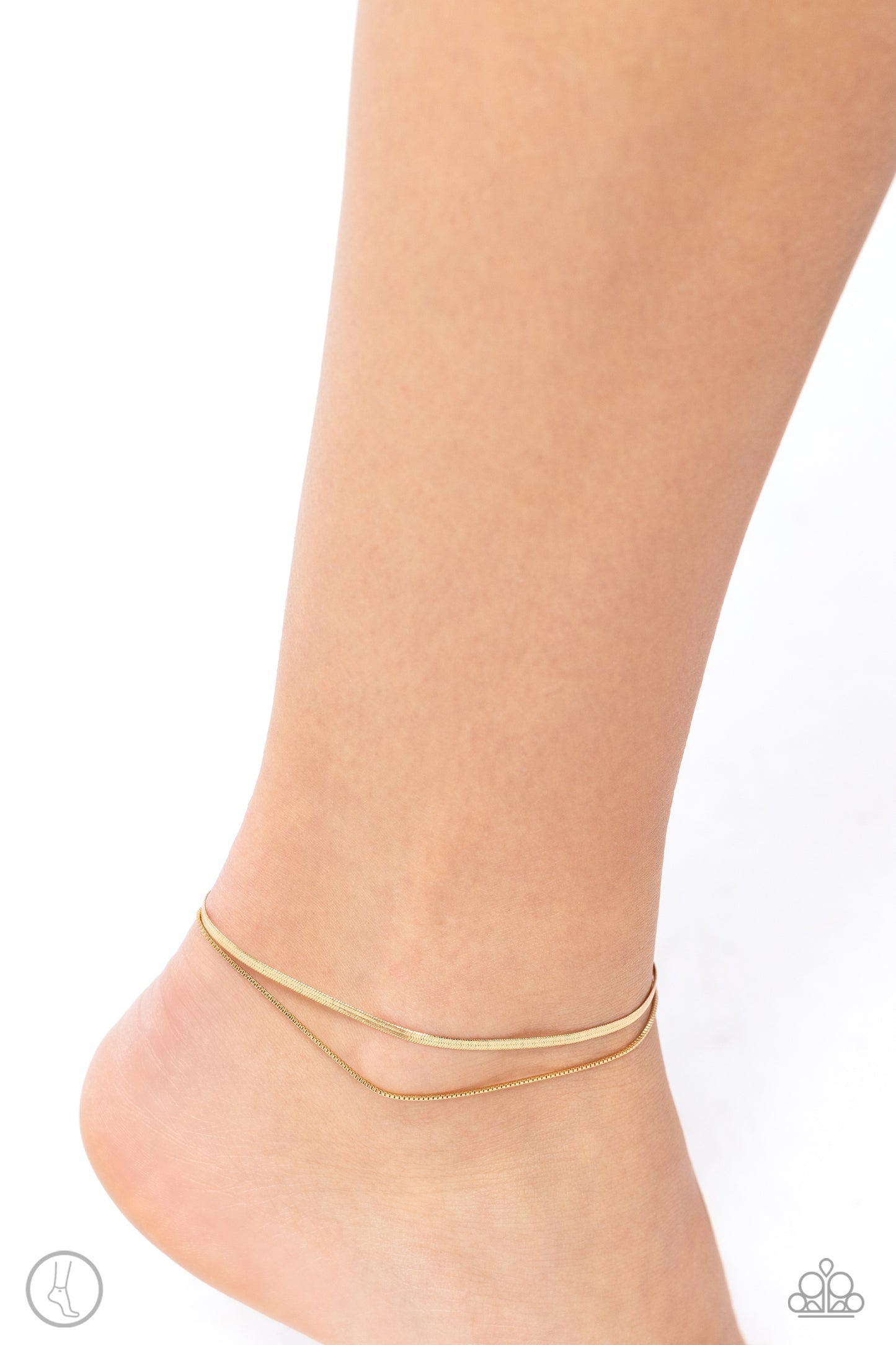 Glistening Gauge Gold Anklet - Paparazzi Accessories  A strand of flat gold snake chain collides with a dainty square box chain to create an abstract monochromatic display. Features an adjustable clasp closure.  Sold as one individual anklet.  SKU: P9AN-GDXX-065XX