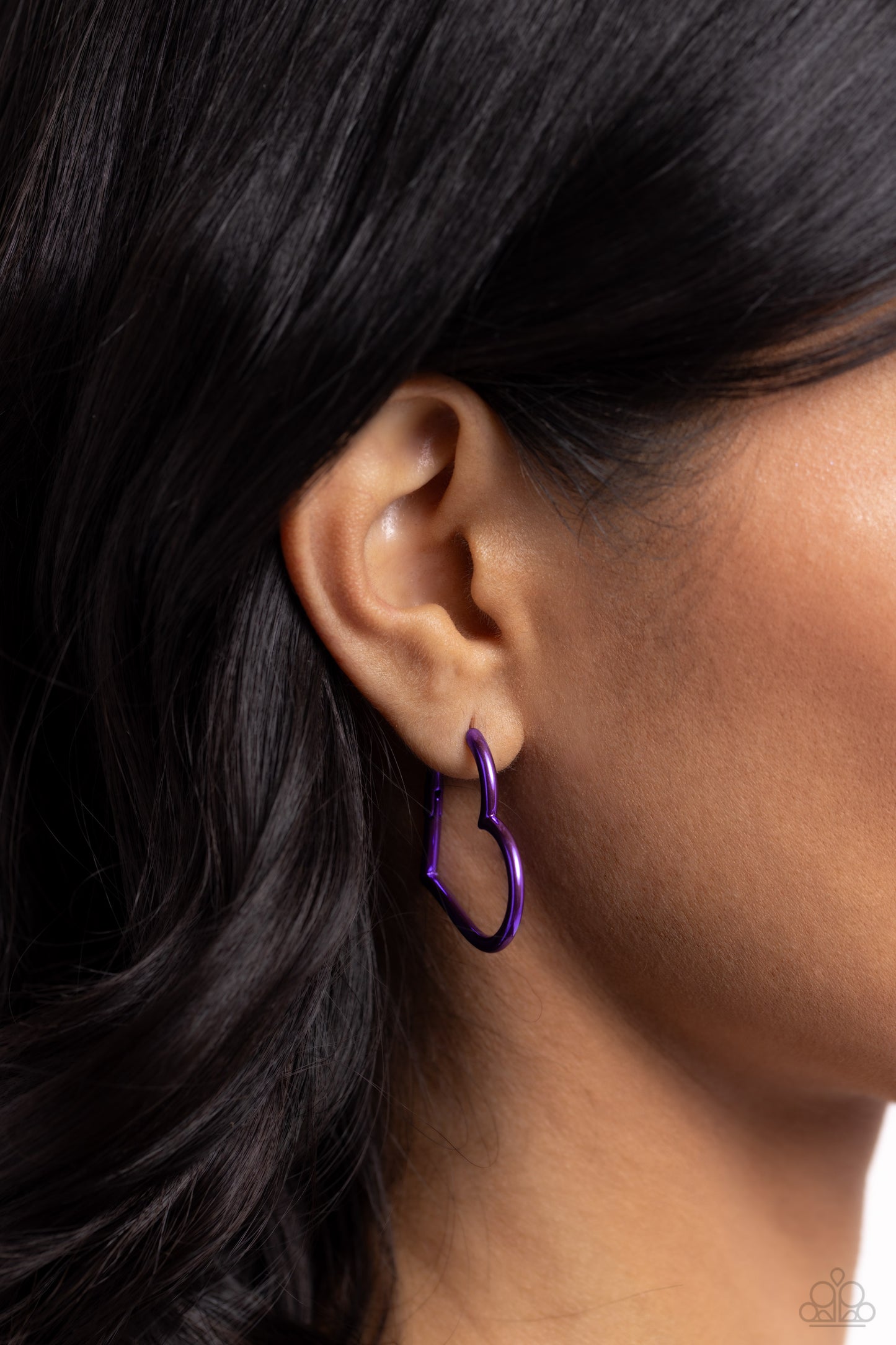 Loving Legend Purple Hinge Hoop - Paparazzi Accessories  Featuring an electric purple hue, a heart silhouette hoop snugly curls around the ear for a colorfully romantic display. Earring attaches to a standard hinge closure fitting. Hoop measures approximately 1 1/2" in diameter.  Sold as one pair of hinge hoop earrings.  SKU: P5HO-PRXX-029XX