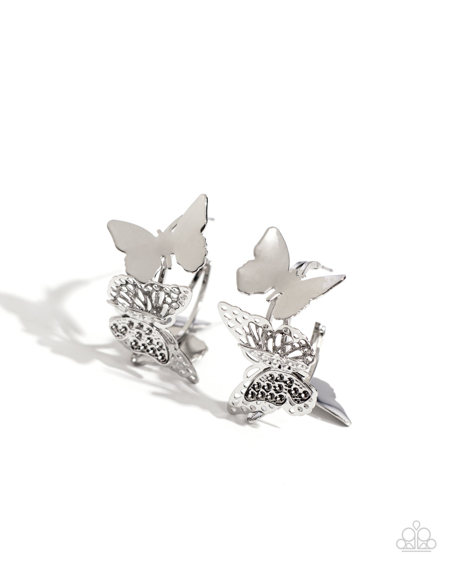 No WINGS Attached Silver Butterfly Hoop Earring - Paparazzi Accessories Fluttering atop an airy silver hoop, a 3D airy silver butterfly pairs with a sleek silver butterfly for a whimsical statement along the ear. Earring attaches to a standard post fitting. Hoop measures approximately 1" in diameter. Sold as one pair of hoop earrings. SKU: P5HO-SVXX-396XX