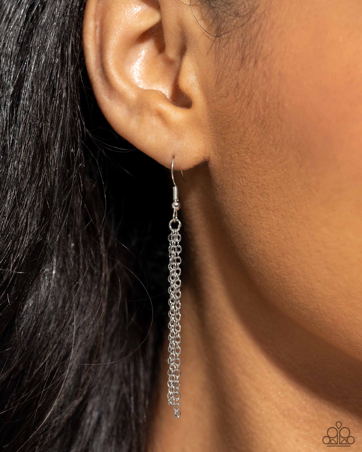 Seashell Sonata Silver Necklace - Paparazzi Accessories A mismatched collection of dainty silver and satellite silver chains loop and layer below the neckline. Dangling along each layer, textured silver seashells and a starfish create a coastal centerpiece. Features an adjustable clasp closure. Sold as one individual necklace. Includes one pair of matching earrings. SKU: P2SE-SVXX-184WP