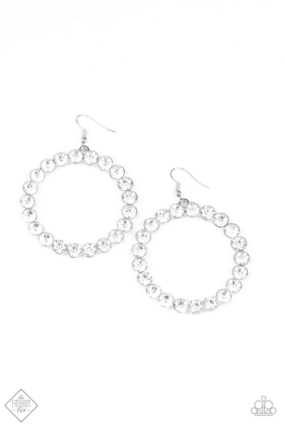 Welcome to the GLAM-boree White Rhinestone Earring - Paparazzi Accessories Featuring sleek silver fittings, oversized white rhinestones spin into a glittery hoop with a blinding finish. Earring attaches to a standard fishhook fitting. Sold as one pair of earrings.