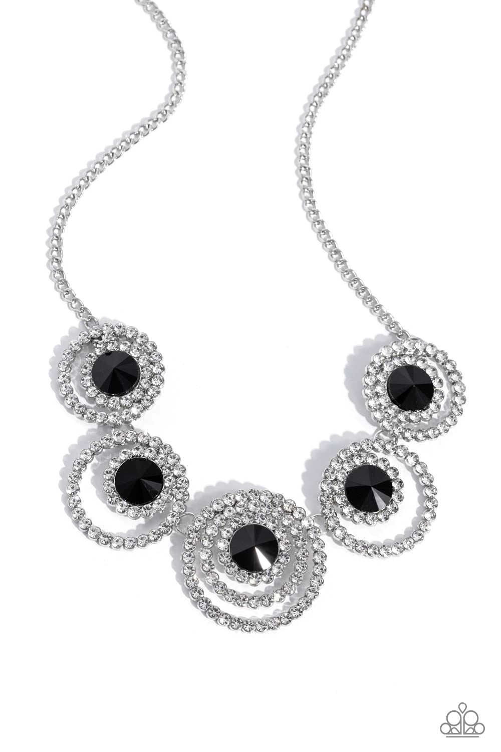 Dramatic Darling Black Necklace - Paparazzi Accessories  Encrusted in glassy white rhinestones, layered silver frames delicately connect below the collar for a statement-making finish. Featured in the center of the effervescent rings, faceted black beads come to a point for a dramatic touch of color along the neckline. Features an adjustable clasp closure.  Sold as one individual necklace. Includes one pair of matching earrings.  SKU: P2RE-BKXX-470XX