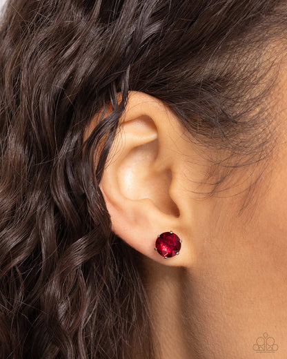 Breathtaking Birthstone Red Post Earring - Paparazzi Accessories  A sparkling garnet rhinestone is nestled inside a classic silver frame for a beautiful birthstone-inspired display. Earring attaches to a standard post fitting.  Sold as one pair of post earrings.  P5PO-RDXX-052TV