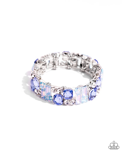 Scattered Showcase Multi Stretch Bracelet - Paparazzi Accessories  Infused with round white gem accents, a mismatched assortment of square, rectangular, and emerald-cut gems in various shades of blue coalesce into a refined pattern along a stretchy band for an intense sparkle around the wrist.  Sold as one individual bracelet.  P9ST-BLXX-047XX
