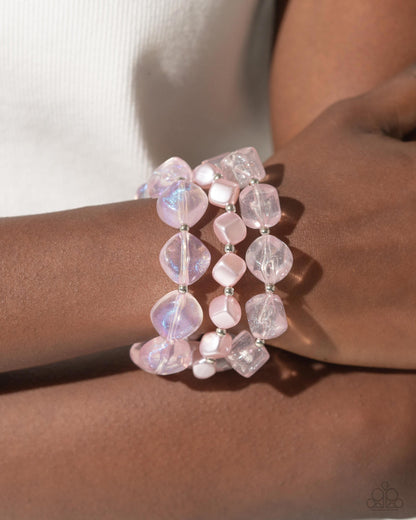Glittery Gala Pink Stretch Bracelet - Paparazzi Accessories Cubed baby pink pearls join a strand of baby pink acrylics and glittery acrylics that alternate with silver beads along elastic stretchy bands around the wrist for a sweet stack. Sold as one set of three bracelets. SKU: P9ST-PKXX-028VO Get The Complete Look! Necklace: "Cubed Cameo - Pink" (Sold Separately)