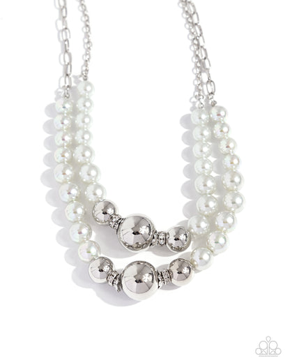 Ballroom Balance Silver Necklace - Paparazzi Accessories Infused along a silver paperclip and classic silver chain, a collection of glossy gray pearls and high-sheen silver beads in various sizes cascade around the collar in layers for an elegant display. Features an adjustable clasp closure. Sold as one individual necklace. Includes one pair of matching earrings. SKU: P2ST-SVXX-220XX