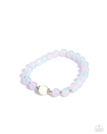 Mermaid Mirror Pink Stretch Bracelet - Paparazzi Accessories  Pink to blue ombré beads, dainty silver beads, and an iridescent-dipped pearl are infused along an elastic stretchy band along the wrist for a mermaid-inspired masterpiece.  Sold as one individual bracelet.  P9RE-PKXX-330XX