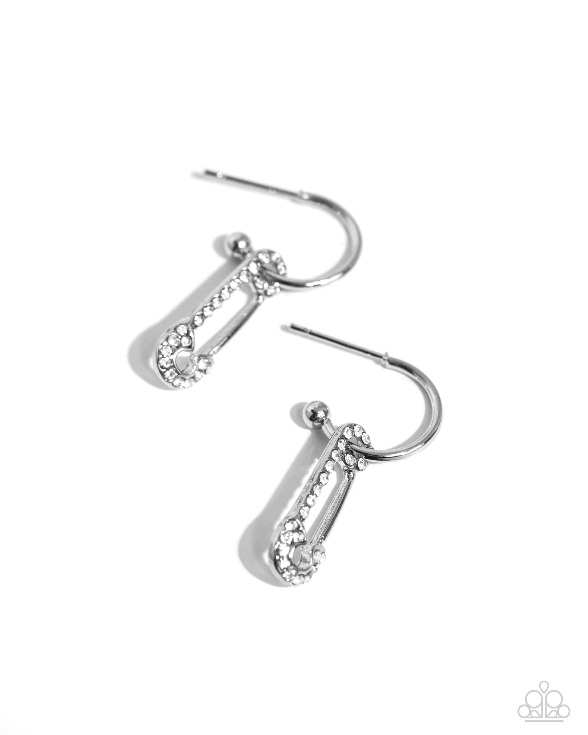 Safety Pin Sentiment White Mini Hoop Earring - Paparazzi Accessories A small, skinny, shiny silver hoop curves around the ear in a timeless fashion. A shiny silver ball is affixed to the end of the hoop, reminiscent of a barbell fitting. A white rhinestone-embellished safety pin charm slides along the curvature of the hoop, adding a surprising hint of edgy movement. Hoop measures approximately 1/2" in diameter. SKU: P5HO-WTXX-175VX Necklace: "Safety Pin Style - White" (Sold Separately)