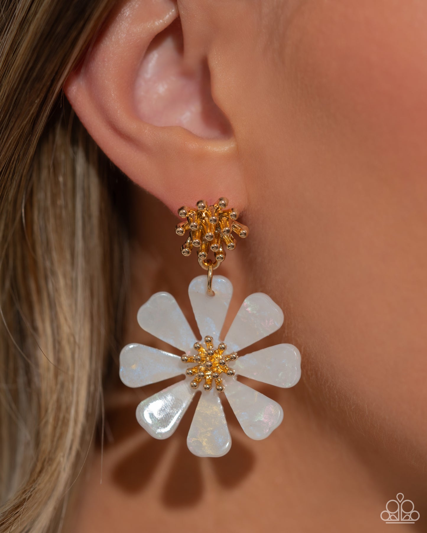 Poetically Pastel White Flower Post Earring - Paparazzi Accessories A collection of tactile gold studs gives way to an acrylic, pastel-patterned white flower that also blooms around a gold studded center, infusing the design with whimsical, soft movement. Earring attaches to a standard post fitting. Sold as one pair of post earrings. P5PO-WTXX-427AR