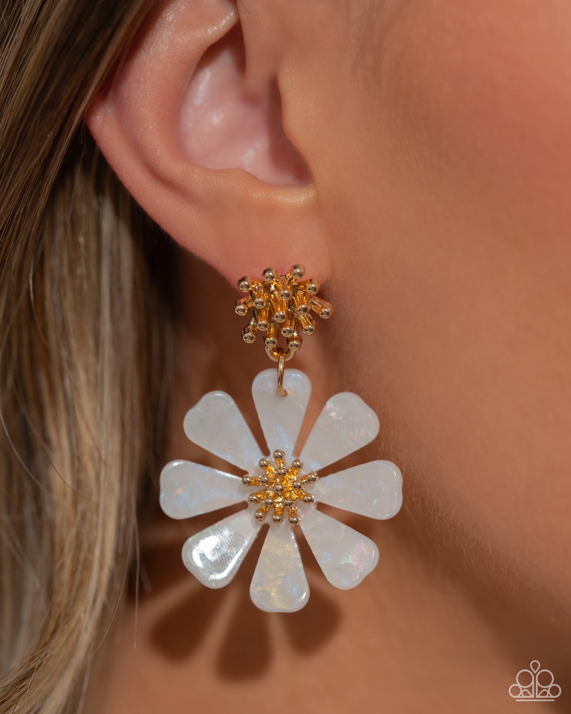 Poetically Pastel White Flower Post Earring - Paparazzi Accessories A collection of tactile gold studs gives way to an acrylic, pastel-patterned white flower that also blooms around a gold studded center, infusing the design with whimsical, soft movement. Earring attaches to a standard post fitting. Sold as one pair of post earrings. P5PO-WTXX-427AR