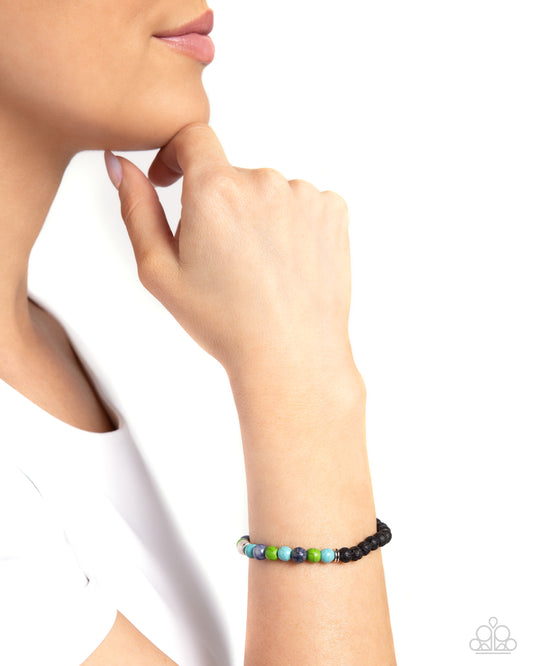 LAVA Will Find a Way Blue Unisex Stretch Bracelet - Paparazzi Accessories  A collection of black lava stones connect to apple, turquoise, and lapis stones and duos of silver discs along the wrist for an explosive display of earthiness and color. As the stone elements in this piece are natural, some color variation is normal.  Sold as one individual bracelet.  P9UR-BLXX-256XX