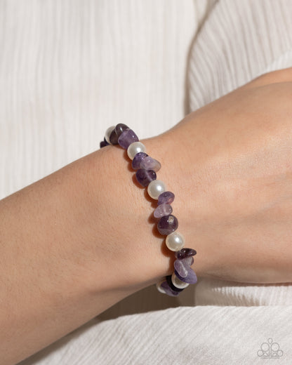 Robust Refinement Purple Stretch Bracelet - Paparazzi Accessories  A collection of amethyst stones and white pearls are infused along an elastic stretchy band for a refined, tranquil statement. As the stone elements in this piece are natural, some color variation is normal.  Sold as one individual bracelet.  SKU: P9SE-PRXX-204WV   Get The Complete Look! Necklace: "Nostalgically Noble - Purple" (Sold Separately)