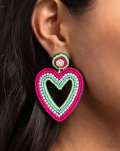 Headfirst Heart Green Seed Bead Post Earring - Paparazzi Accessories Revolving around a white gem center, a collection of apple green and hot pink seed beads and dainty white rhinestones creates a colorful post that gives way to a heart silhouette also embellished in hot pink, apple green, and tiffany seed beads, and white rhinestones for a Sunset-inspired display. Earring attaches to a standard post fitting. Sold as one pair of post earrings. P5PO-GRXX-057XX