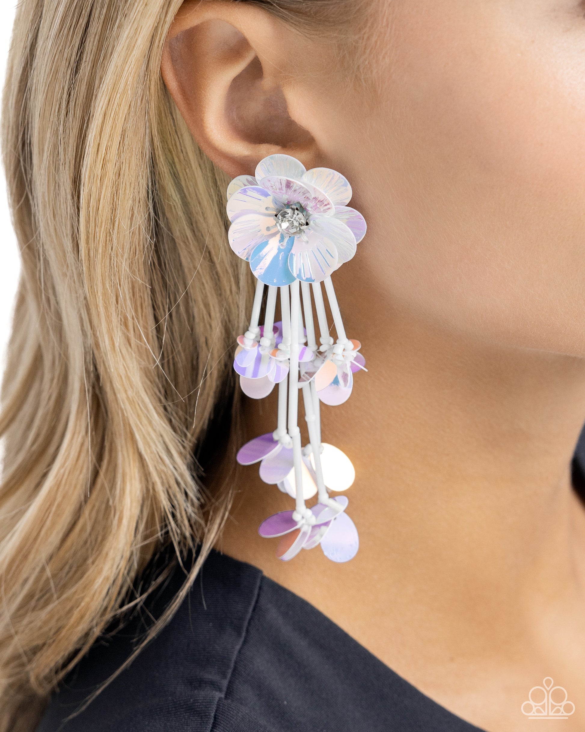 Floral Future White Flower Post Earring - Paparazzi Accessories Blooming from a faceted white gem center, textured white iridescent sequin petals give way to a collection of white cylindrical beaded strands that elongate the neck. Sporadically bursting amongst the strands, a collection of simple white iridescent sequins flicker and flash for additional eye-catching interest. Earring attaches to a standard post fitting. Sold as one pair of post earrings. P5PO-WTXX-424XX
