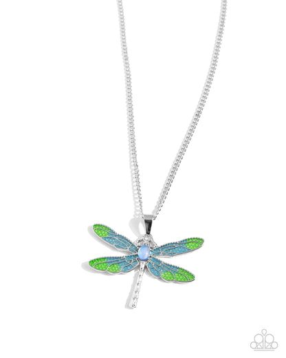 DRAGONFLY to the Sky Blue Necklace - Paparazzi Accessories Featuring a classic silver chain, a Capri Blue and light green painted silver dragonfly pendant glides along the neckline for a colorfully rustic centerpiece. An opalescent blue oval bead is pressed in the center of the display while textured silver connects and creates the rest of the dragonfly's body for additional eye-catching color and character. Features an adjustable clasp closure. Includes one pair of matching earrings. P2RE-BLXX-439XX