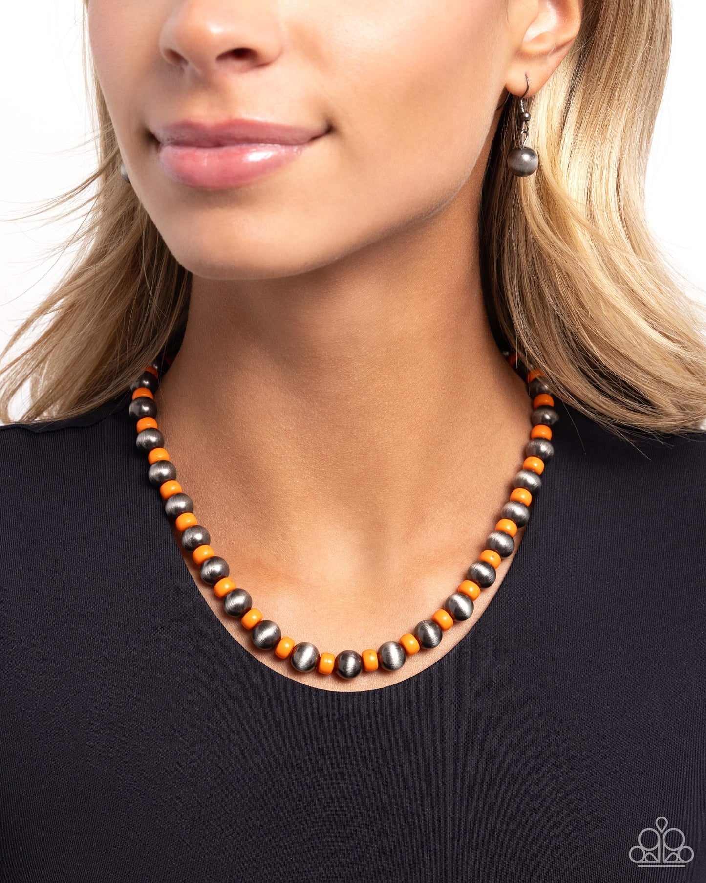 Contemporary Confidence Orange Necklace - Paparazzi Accessories  Infused along an invisible string, a collection of Orangeade discs alternates with textured, high-sheen silver beads for a pop of contemporary color along the neckline. Features an adjustable clasp closure.  Sold as one individual necklace. Includes one pair of matching earrings.  SKU: P2SE-OGXX-305XX