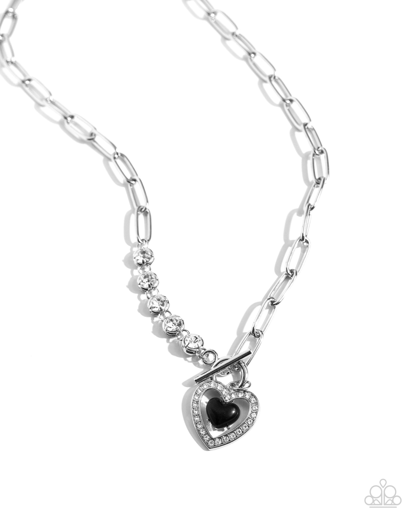 Soft-Hearted Style Black Heart Necklace - Paparazzi Accessories A gleaming black acrylic heart is nestled inside an airy, white rhinestone-encrusted heart frame, creating a charming pendant at the bottom of an exaggerated silver paperclip chain. A quintet of white gems interrupts the silver paperclip chain for additional refinement and shimmer. Features a toggle clasp closure. Sold as one individual necklace. Includes one pair of matching earrings. SKU: P2RE-BKXX-483XX