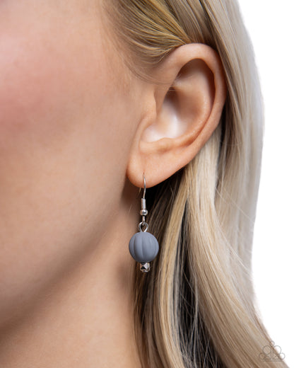 Whimsically Wealthy Black Necklace - Paparazzi Accessories Smoky faceted beads, silver beads, Sharkskin beads, and black matte beads are infused along classic silver chains that layer below the neckline for a colorfully charismatic look. Features an adjustable clasp closure. Sold as one individual necklace. Includes one pair of matching earrings. SKU: P2WH-BKXX-325XX