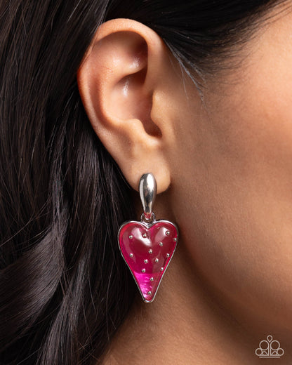 Glossy Goodwill Pink Post Earring - Paparazzi Accessories  A curved silver post gives way to a glossy jelly-like pink strawberry pendant embellished with silver "seeds" for a sweet, summery statement. Earring attaches to a standard post fitting.  Sold as one pair of post earrings.  P5PO-PKXX-125XX