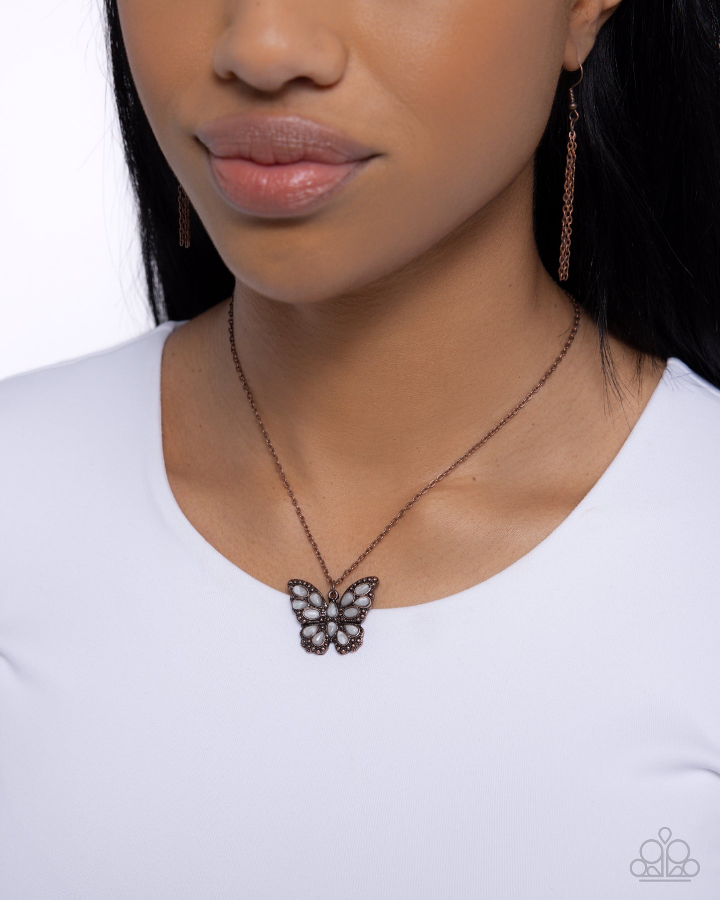 Santa Fe Satisfaction Copper Butterfly Necklace - Paparazzi Accessories  Featuring white stones in varying shapes, a copper-studded butterfly flutters along a dainty copper cable chain below the neckline for a whimsically reflective look. Features an adjustable clasp closure. As the stone elements in this piece are natural, some color variation is normal.  Sold as one individual necklace. Includes one pair of matching earrings.  P2SE-CPXX-180XX