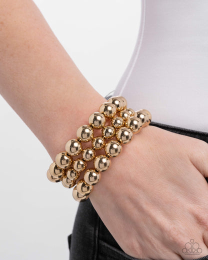 Refreshing Raindrops Gold Coil Bracelet - Paparazzi Accessories