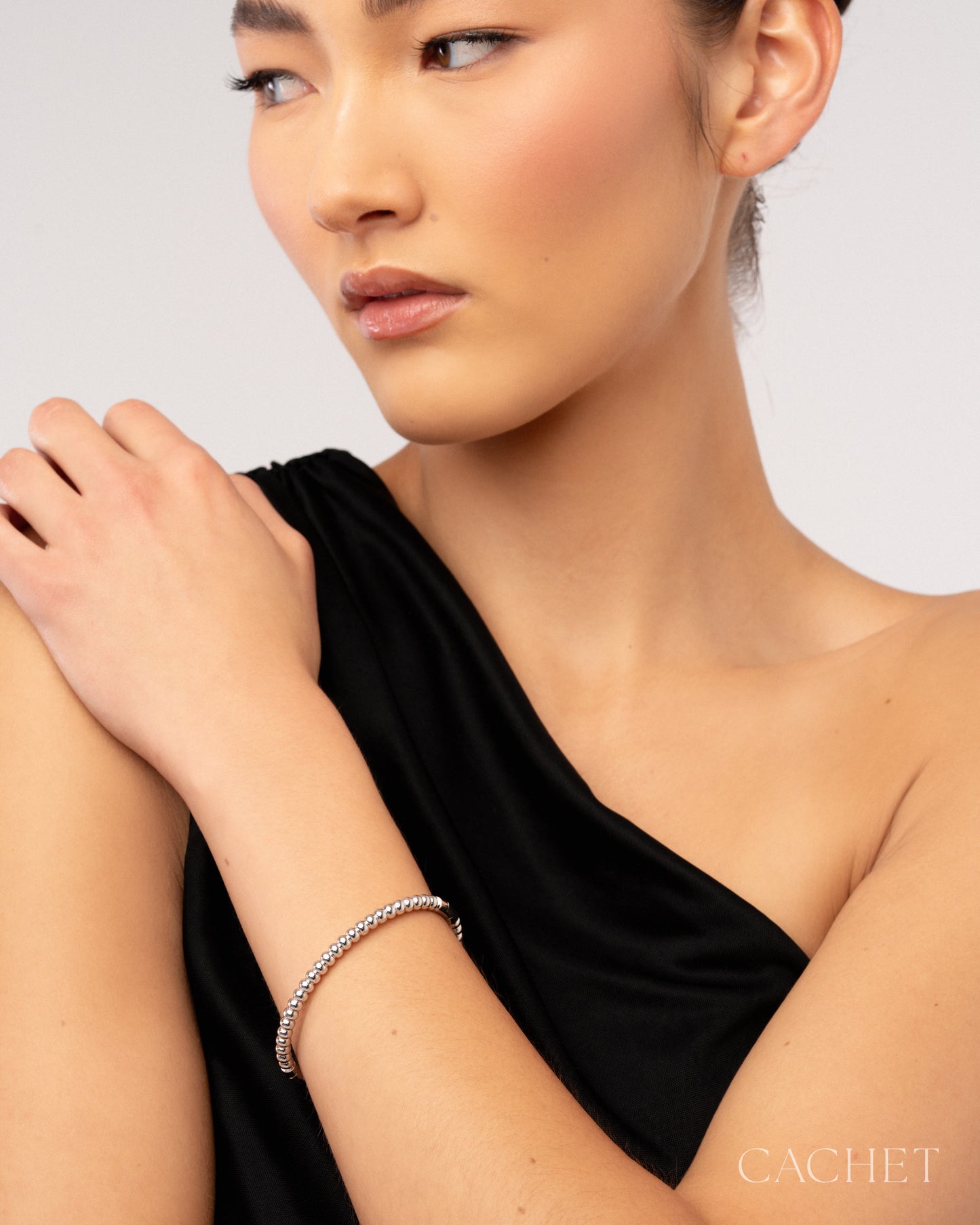 Raydia Rhodium Plated Hinge Hoop Bracelet - Cachet by Paparazzi